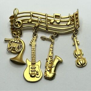 Music and Instrument Brooch. Signed JJ, gold tone